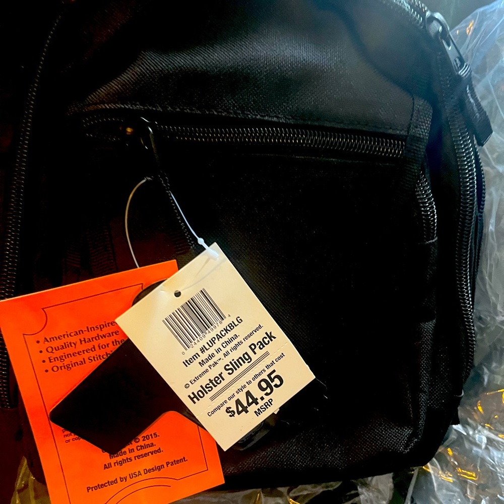Sling bag with cc. New in original packaging with tags